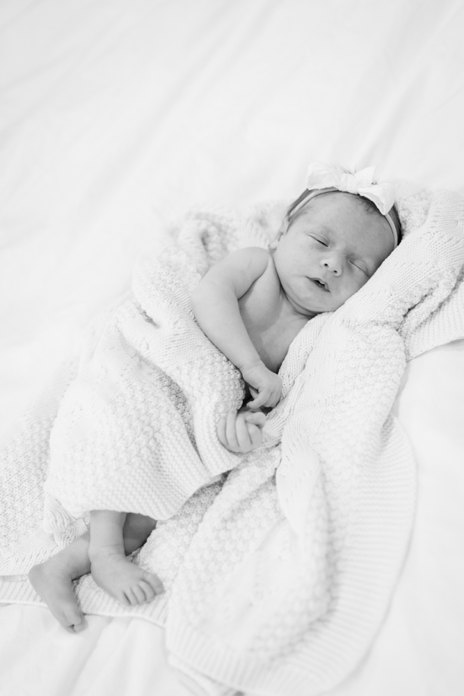 The family with baby Tyler during an in-home newborn session in Fort Worth