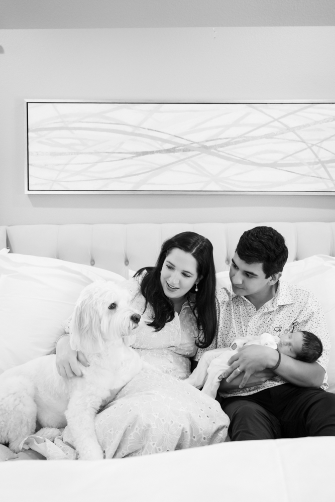 Matthew and Kristin sharing their anniversary cake during Barron's newborn session