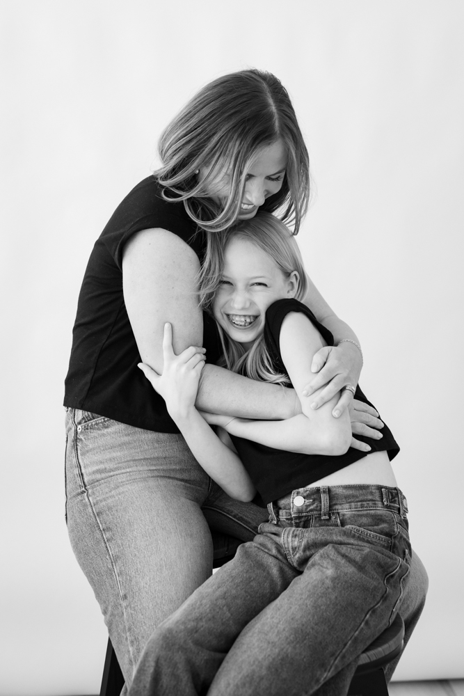 A mother-daughter studio portrait at the Lightly Photography studio